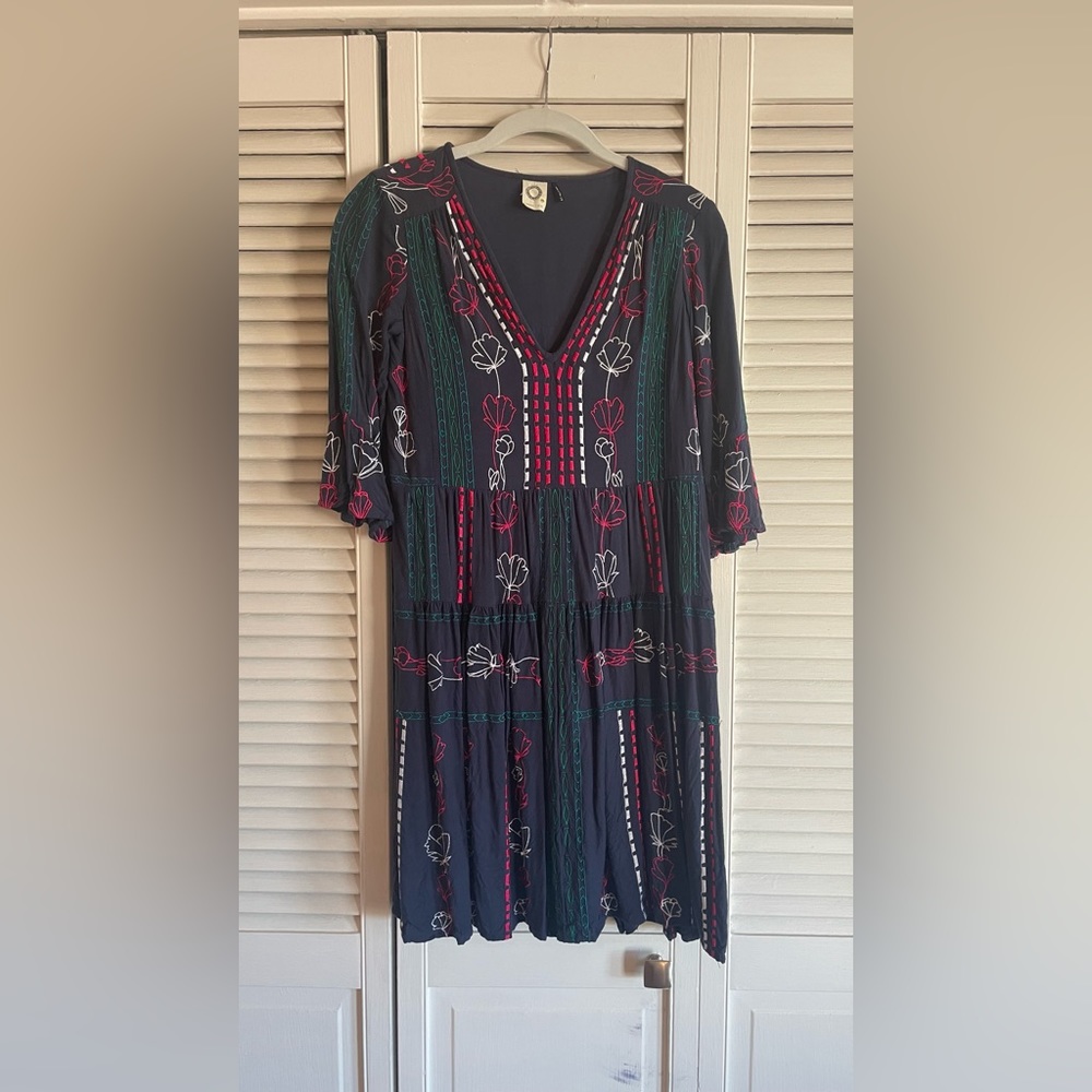 Navy blue dress with embroidery for details